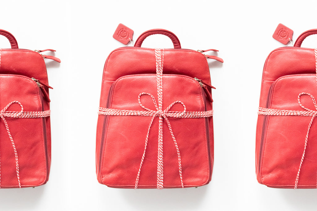 red backpack wrapped in bow